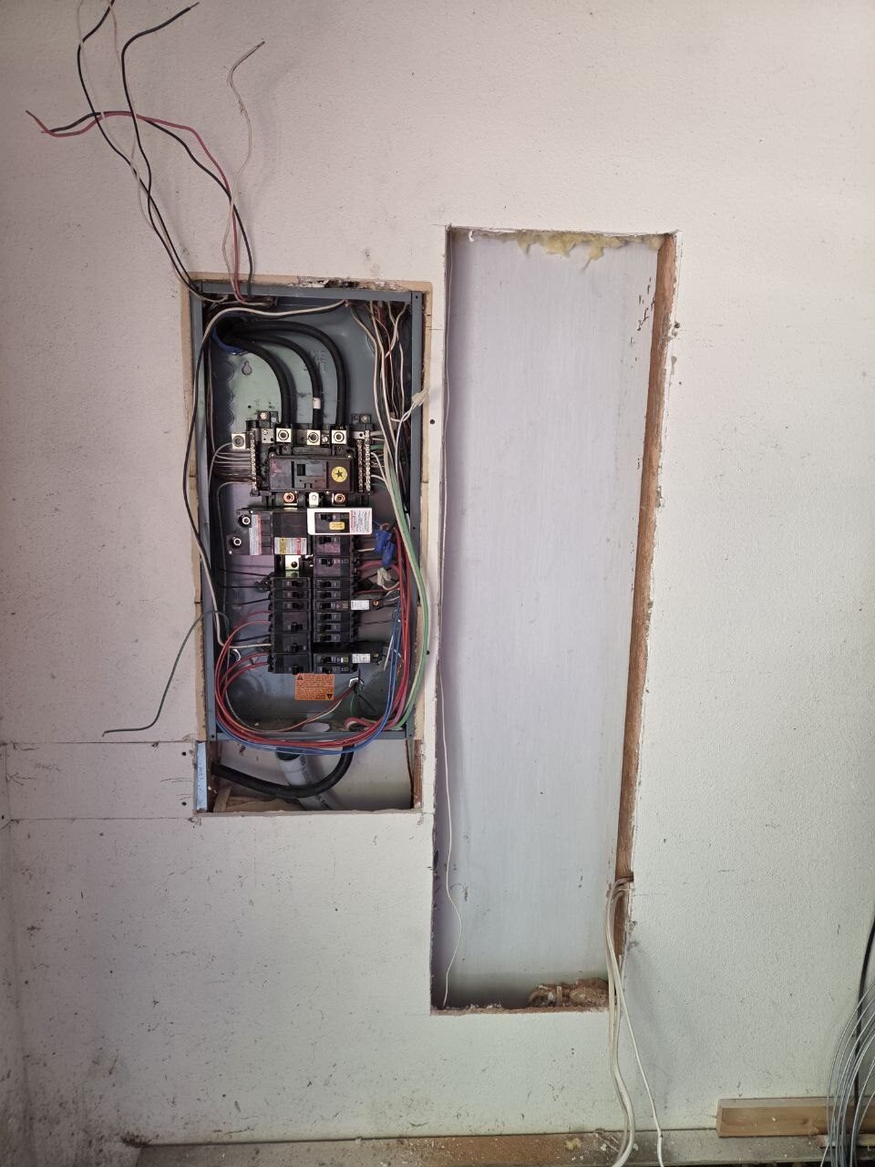 Old residential panel opened before a 200 amp service upgrade in Vancouver WA