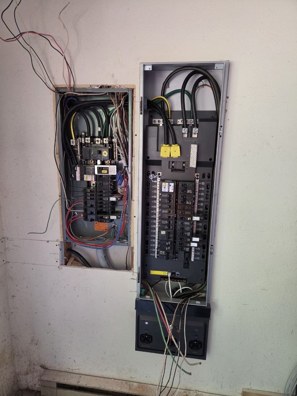 Battery backup system wired alongside a residential service panel in Vancouver WA